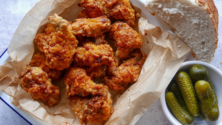 Fried spicy chicken with pickles