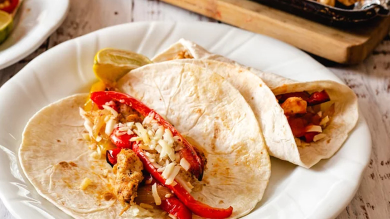 Roasted peppers and chicken on sheet pan