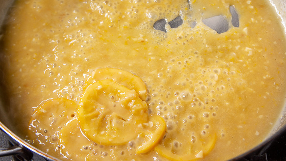 saute pan with creamy yellow lemon sauce 