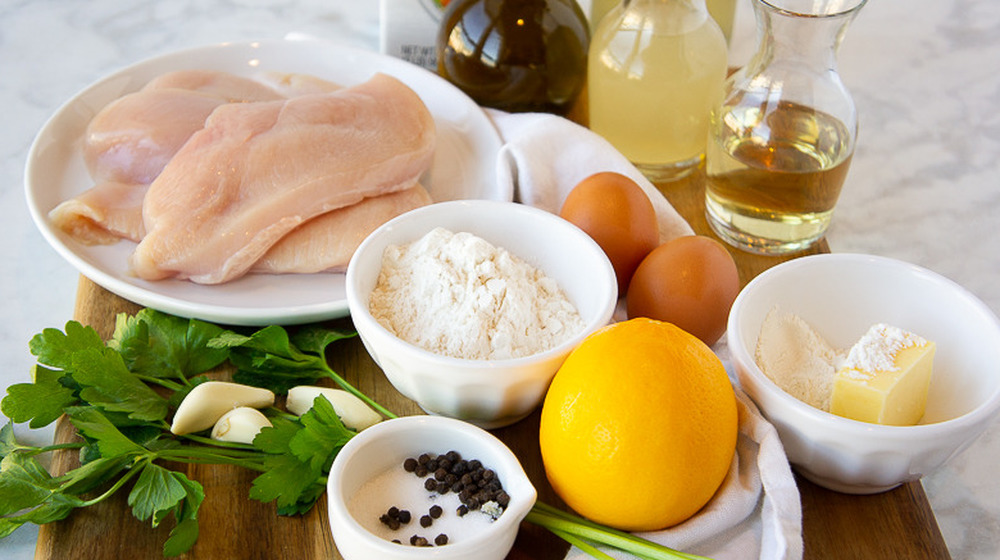 wooden cutting board ingredients for chicken francese