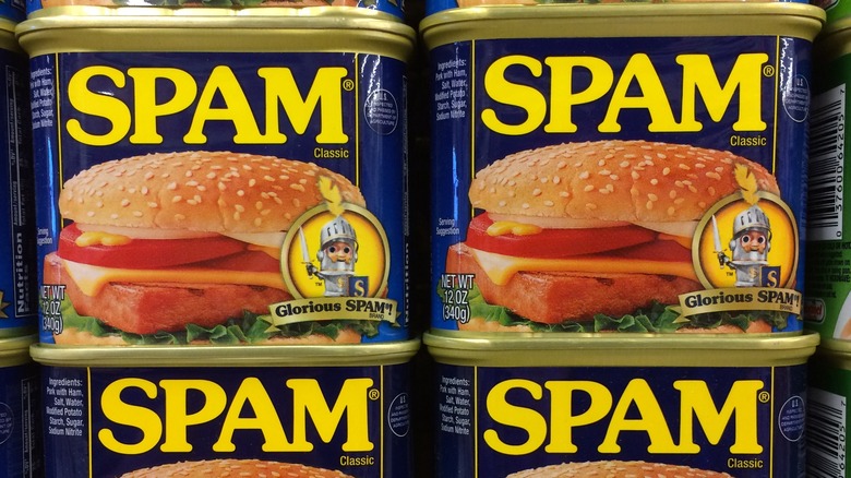 Cans of spam on a shelf