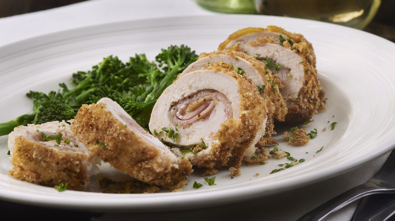 chicken cordon bleu on white plate