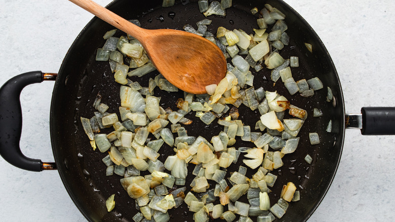 onions cooking in pan