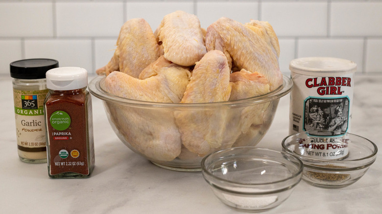 chicken wings in bowl spices