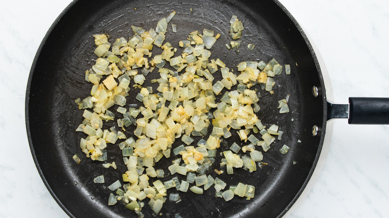 diced onions in skillet 