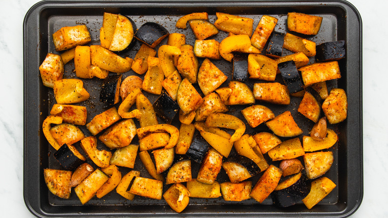 Spice covered veg on baking sheet