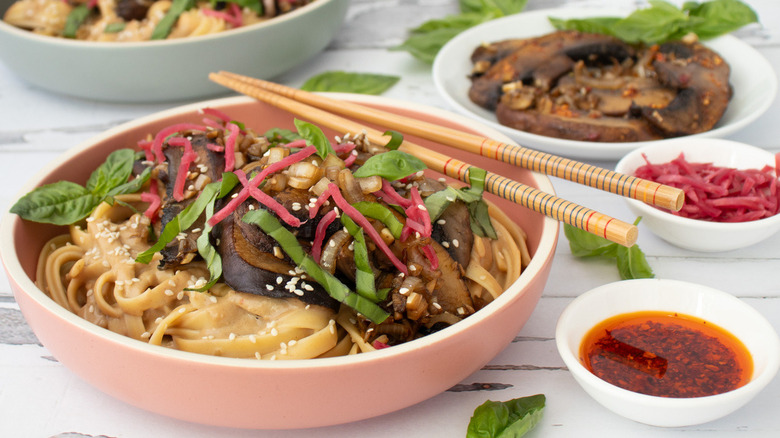 bowl of noodles with chopsticks