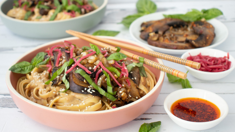 bowl of noodles with chopsticks