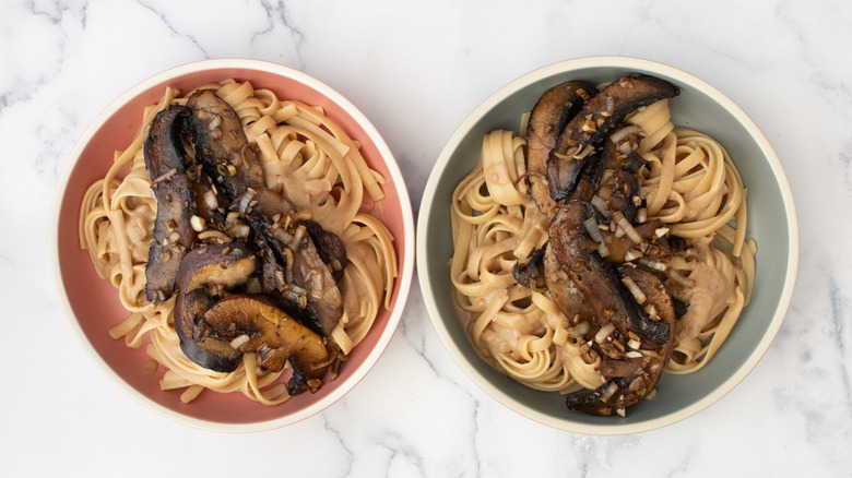 bowls of noodles with mushrooms