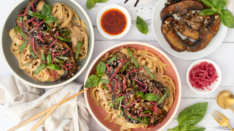 bowls of noodles with mushrooms