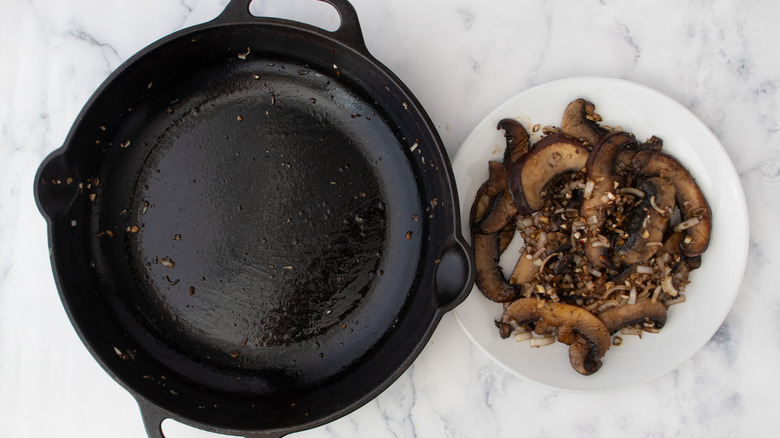 empty pan mushrooms on plate