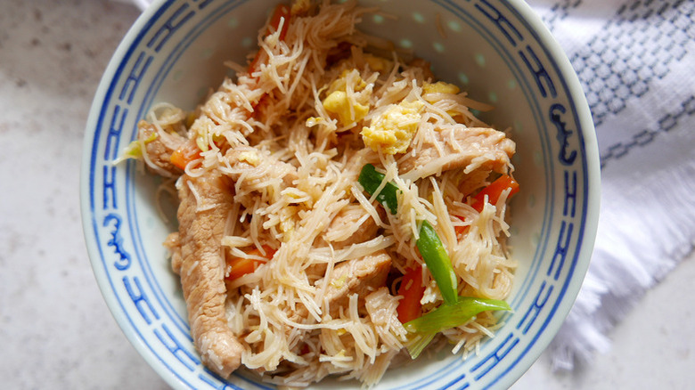 pork and noodles in bowl