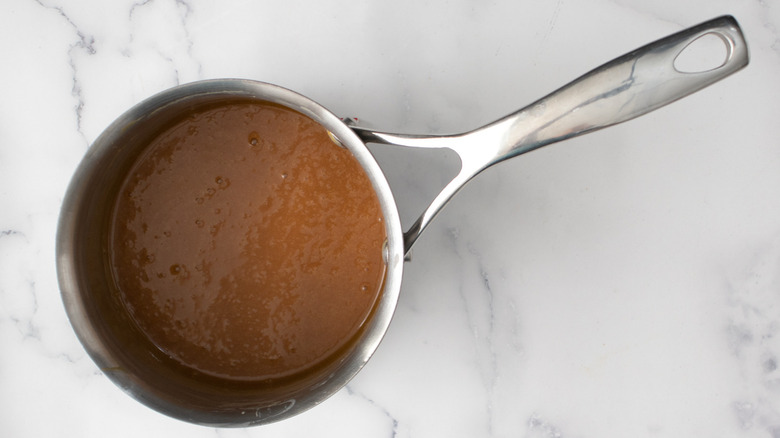 saucepan with caramel sauce