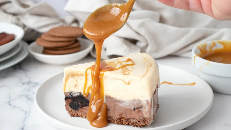 Caramel sauce drizzled on ice cream cake