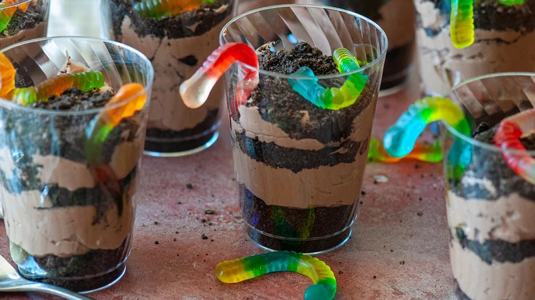 Chocolate puddings with gummy worms