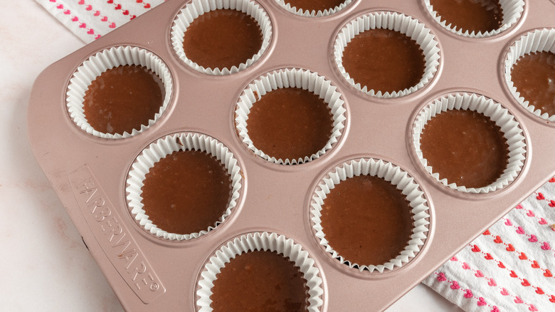 chocolate cupcake batter in  pan