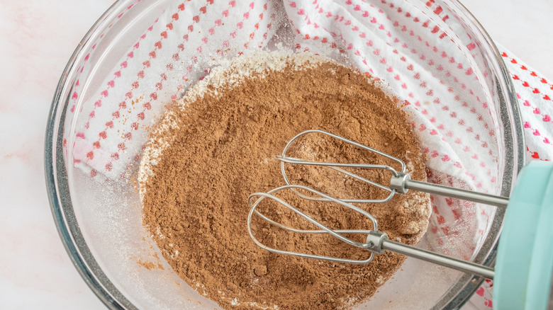 mixing dry chocolate cupcake ingredients