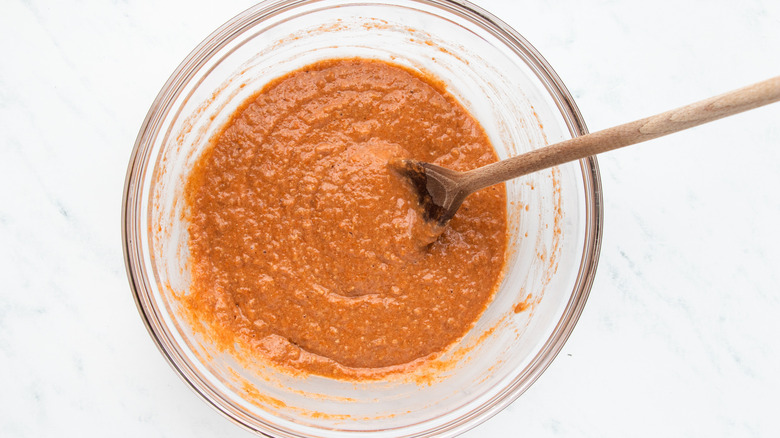 Carrot muffin batter in mixing bowl