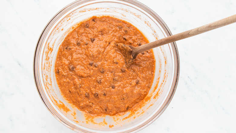 Chocolate chip carrot muffin batter in bowl