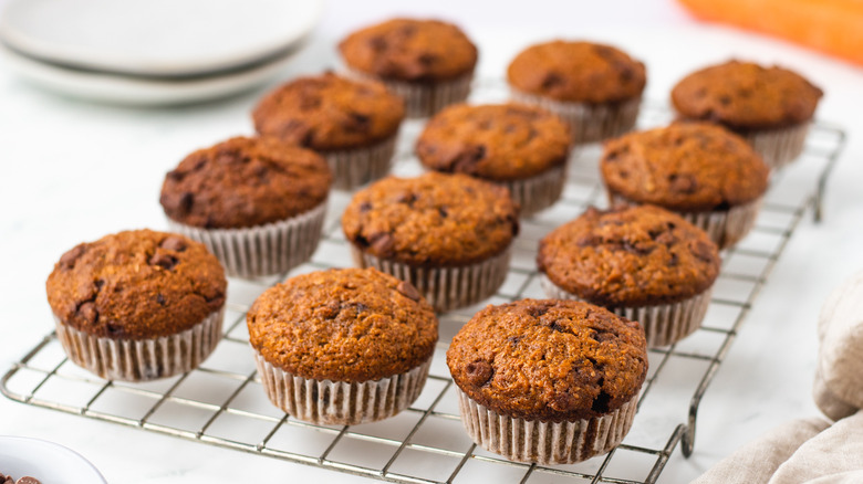 Chocolate chip carrot muffins on a wire rack