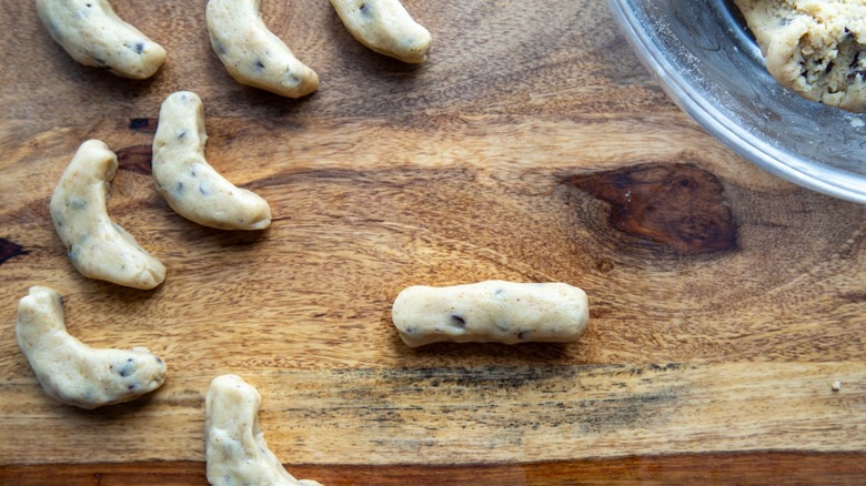 forming cookie dough into crescents
