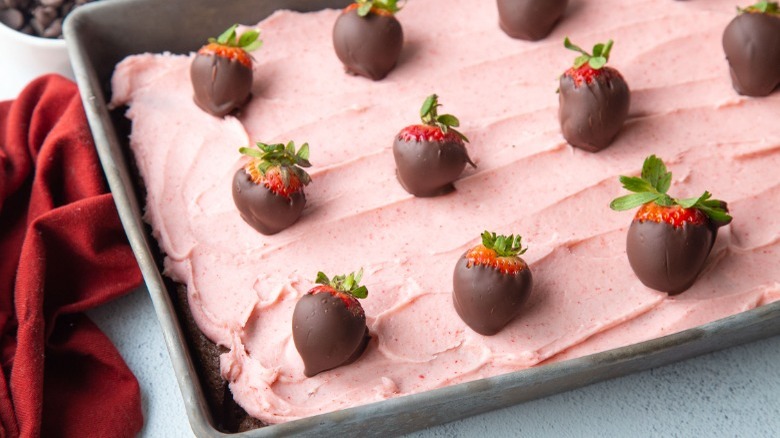 strawberry frosted brownies in pan