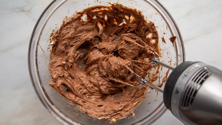 beating hazelnut chocolate cream cheese