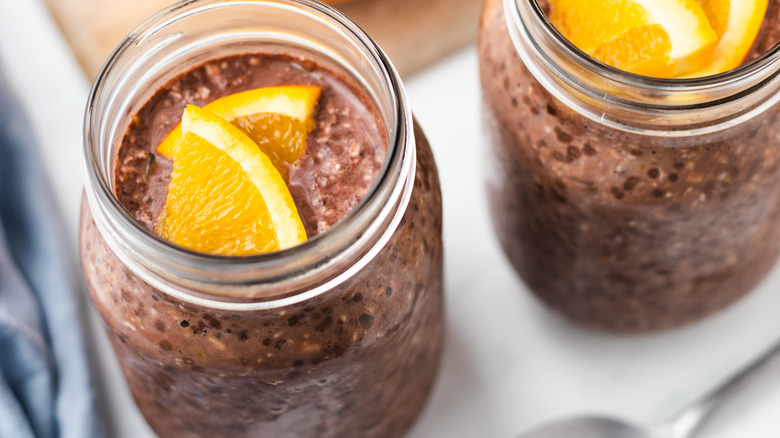 Close up of jars of chocolate orange overnight oats