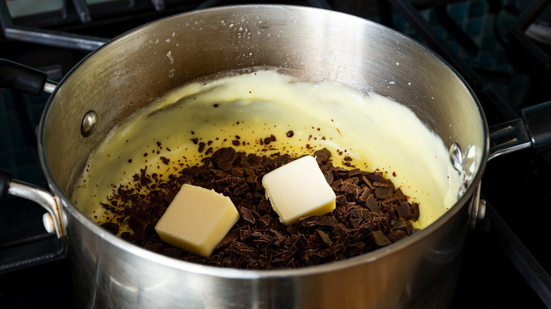 chopped chocolate added to saucepan