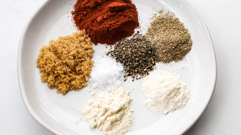 assorted spices on white plate