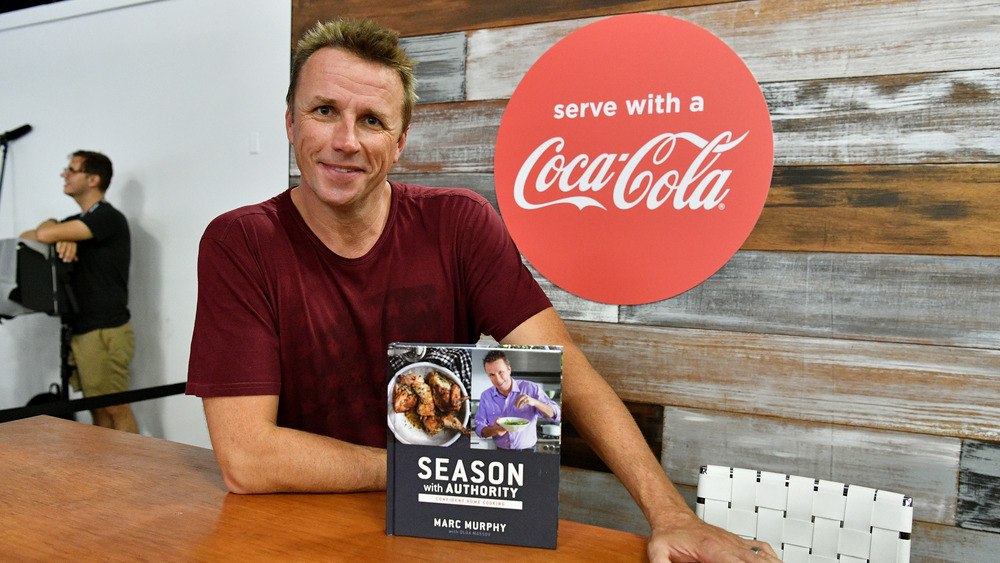 Marc Murphy with his cookbook