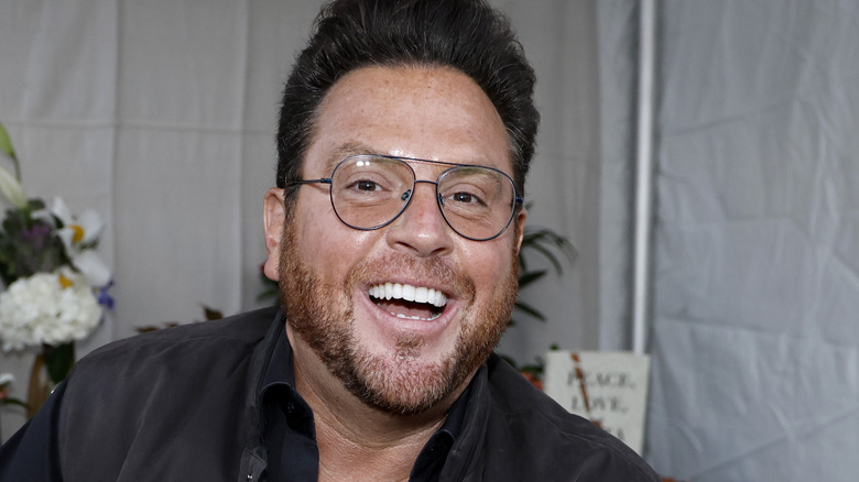 Scott Conant beaming at signing