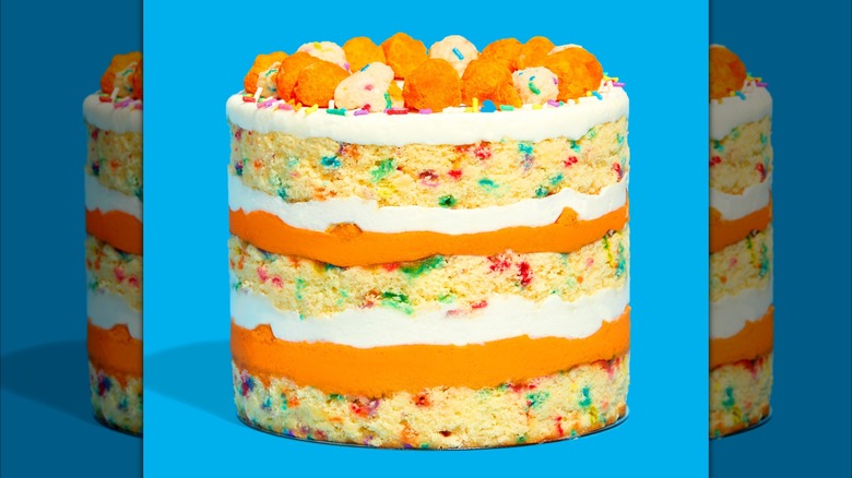 Cheetos cake on blue background