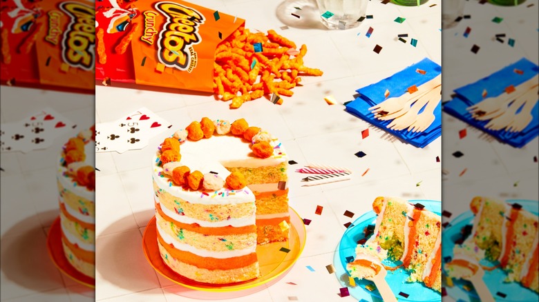 Bag of Cheetos with sliced cake