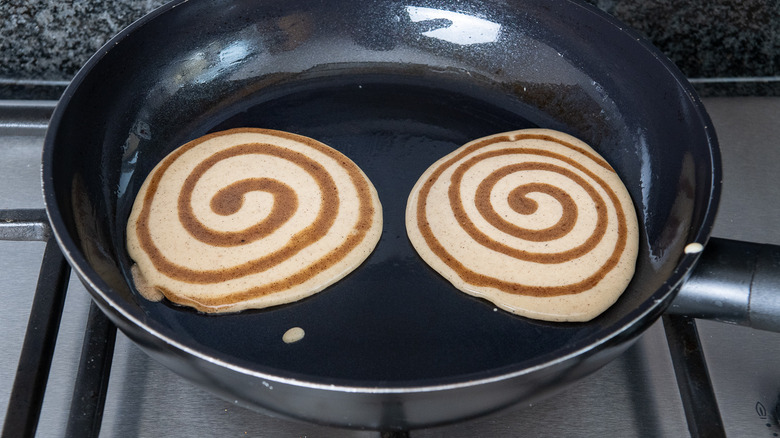 pancakes in pan on stove 