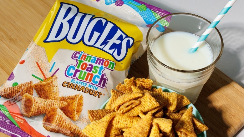 bag and bowl of cinnamon toast crunch bugles with glass of milk