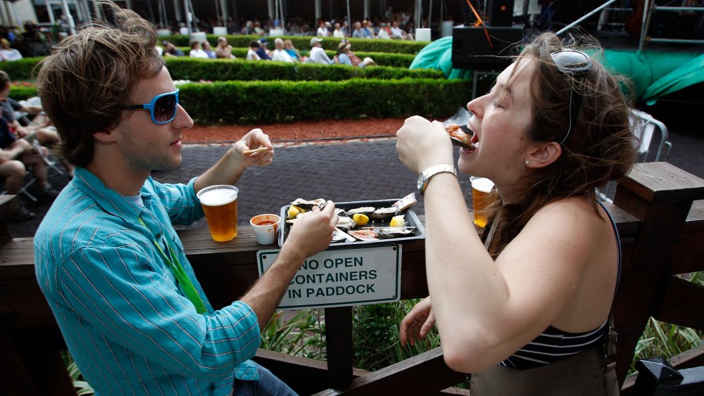 people eating oysters