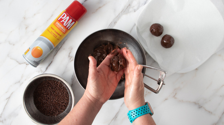 shaping dough into balls