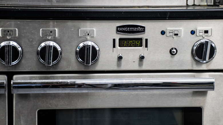 stainless steel rangemaster oven turned on