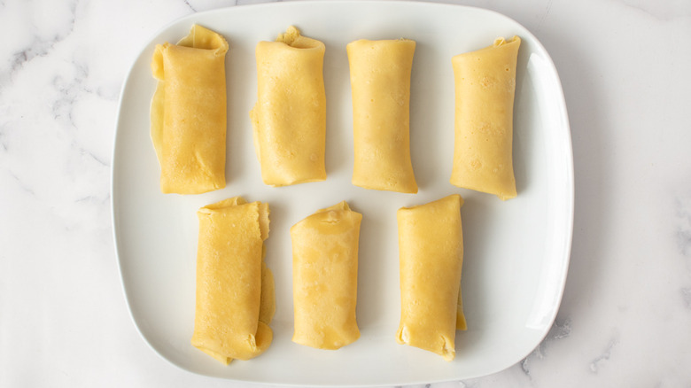 stuffed rolled blintz on plate