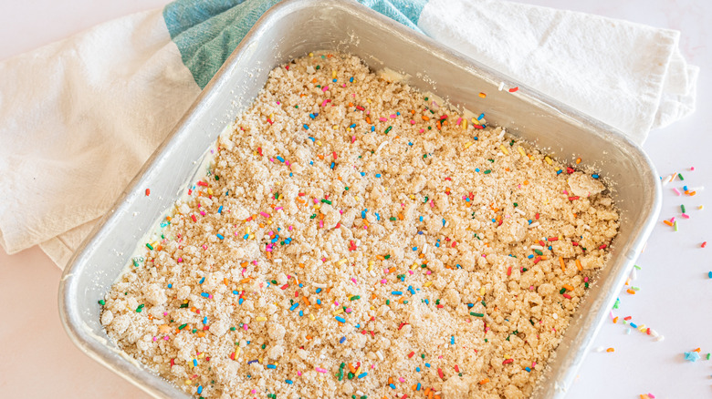 coffee cake with sprinkles in pan