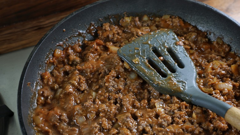 skillet of simmering coney sauce