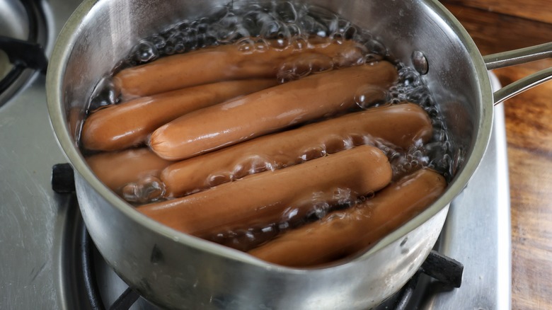 pot of boiling hot dogs