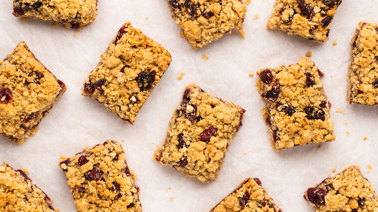 Cranberry oat bars on baking paper