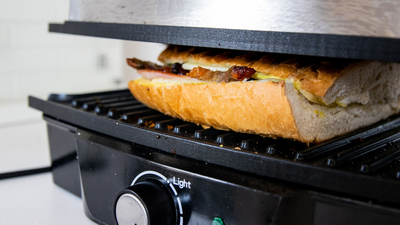 Cuban sandwich in panini press