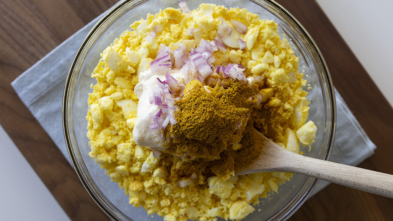 egg salad ingredients in bowl