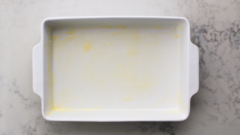 white baking pan with butter