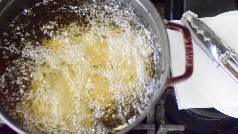 battered salt cod in frying oil