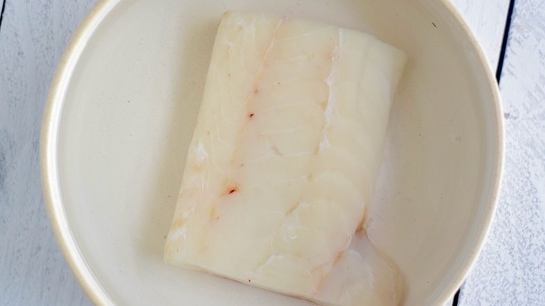 salt cod soaking in water