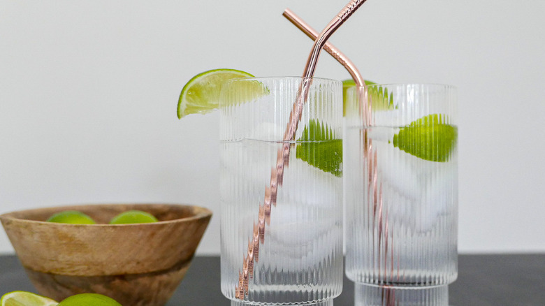 gin and tonics with metal straws